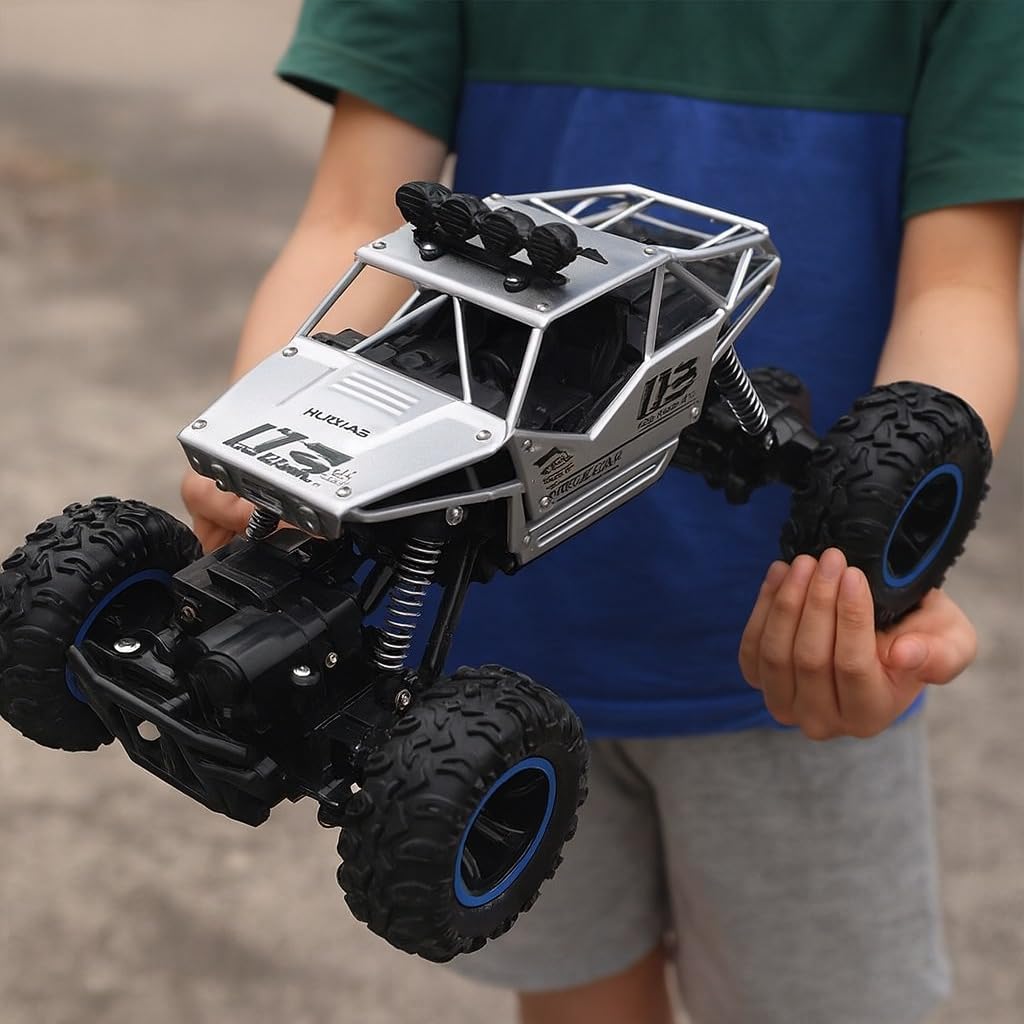 Braintastic 1:16 Big Rock Crawler Monster Truck with Spray, Metal Body Rechargeable RC Off Road Car with High Strength Shockers for Kids and Adults (Silver)